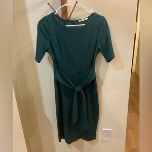 Beautiful form fitting midi green dress